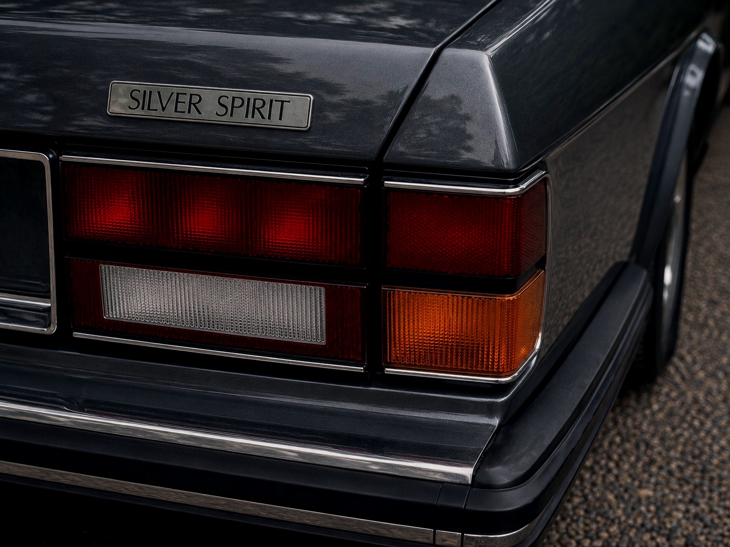 Silver Spirit badge and taillight