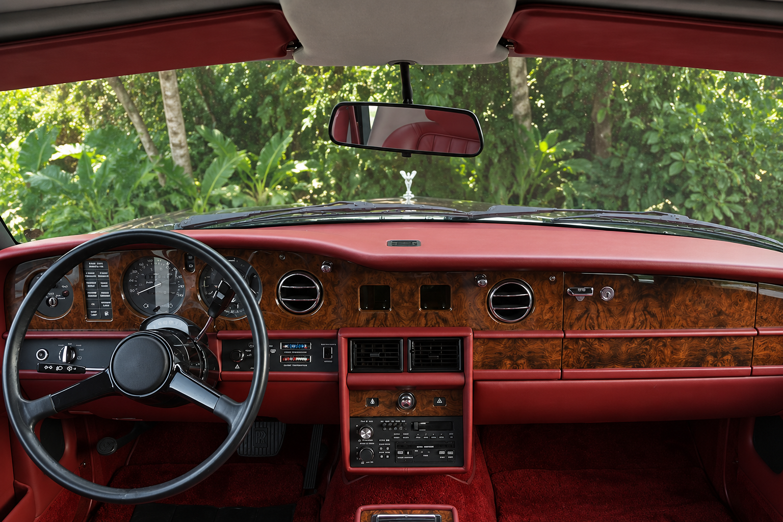 Red leather and burl walnut interior of the Rolls-Royce Silver Spirit